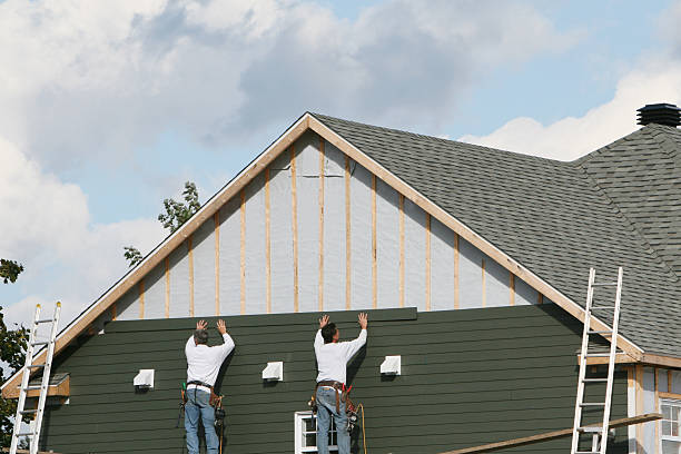 Professional Siding Installation technician working in Richmond, VA